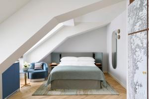 Cama o camas de una habitación en Hotel Angleterre
