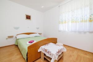 Postel nebo postele na pokoji v ubytování Rooms Mande