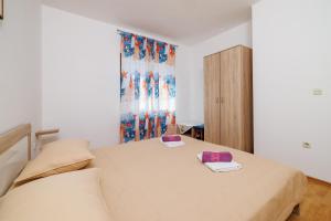 Postel nebo postele na pokoji v ubytování Rooms Mande