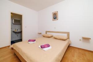 Postel nebo postele na pokoji v ubytování Rooms Mande