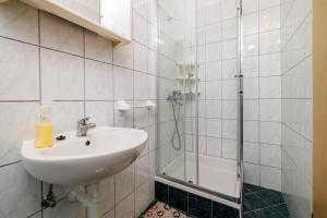 Koupelna v ubytování Rooms Mande