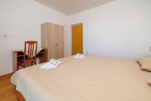 Postel nebo postele na pokoji v ubytování Rooms Mande
