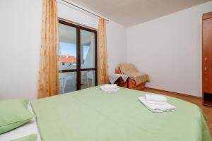 Postel nebo postele na pokoji v ubytování Rooms Mande