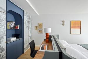 Cama o camas de una habitación en Hotel Angleterre