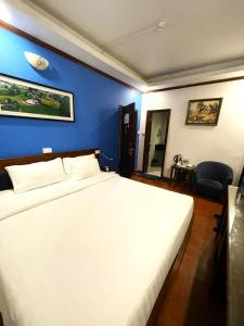 Giường trong phòng chung tại A25 Hotel - 57 Quang Trung