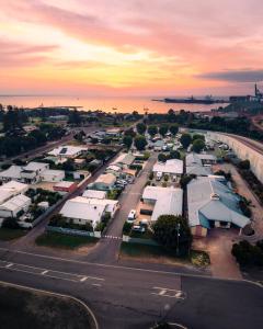 an aerial view of a city with a lot of houses at Esperance Bay Holiday Park in Esperance