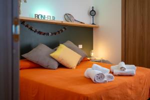 Postel nebo postele na pokoji v ubytování B&B La Timpa Del Cucco