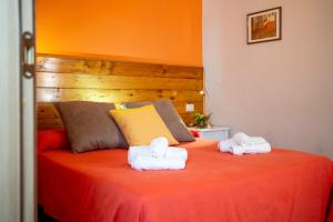 Postel nebo postele na pokoji v ubytování B&B La Timpa Del Cucco