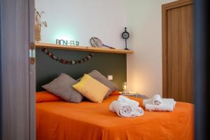 Postel nebo postele na pokoji v ubytování B&B La Timpa Del Cucco