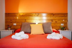 Postel nebo postele na pokoji v ubytování B&B La Timpa Del Cucco