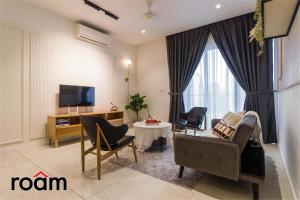 TV a/nebo společenská místnost v ubytování Quill Residences KLCC, Five Senses