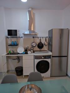 Η κουζίνα ή μικρή κουζίνα στο Valencia Beach PINK +13 φωτογραφίες