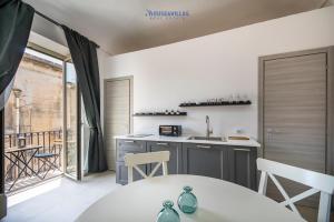 Kuchyň nebo kuchyňský kout v ubytování House & Villas - Demetra