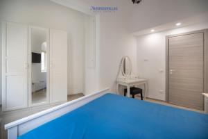 Postel nebo postele na pokoji v ubytování House & Villas - Demetra