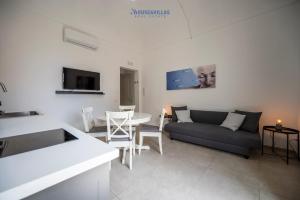 TV a/nebo společenská místnost v ubytování House & Villas - Demetra