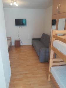 Ένα ή περισσότερα κρεβάτια σε δωμάτιο στο Amel