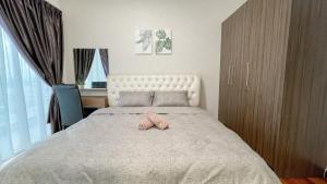 Posteľ alebo postele v izbe v ubytovaní Silverscape Seaview Residence Melaka