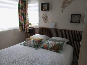Posteľ alebo postele v izbe v ubytovaní Gîte Panda house