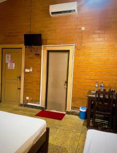Postel nebo postele na pokoji v ubytování Sevenday Hotel