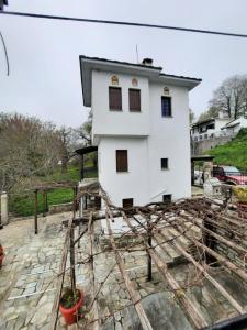 a house under construction on top of a stone floor at Milea Byron House Tsagarada in Tsagarada