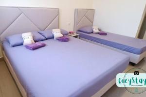 Voodi või voodid majutusasutuse Puchong Skylake Lake-view Condo 3-6pax toas +37 fotot