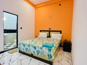 Postel nebo postele na pokoji v ubytování Sevenday Hotel