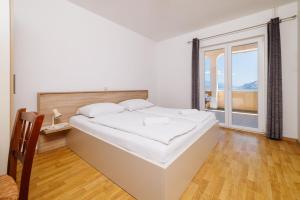 Posteľ alebo postele v izbe v ubytovaní Apartments Ruzica F
