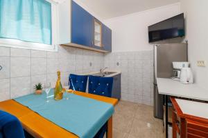 Kuchyňa alebo kuchynka v ubytovaní Apartments Ruzica F