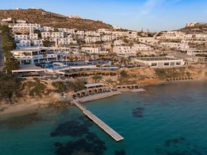 an aerial view of a beach with white buildings at Saint John Hotel Villas & Spa in Agios Ioannis Mykonos