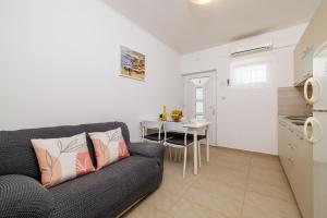 Kuchyňa alebo kuchynka v ubytovaní Apartments Ruzica F