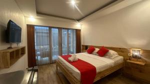 Postel nebo postele na pokoji v ubytování Abian Srama Hotel and Spa