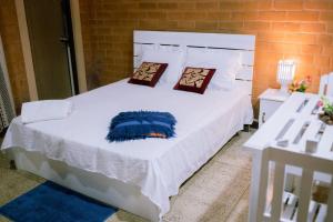 Postel nebo postele na pokoji v ubytování Sevenday Hotel