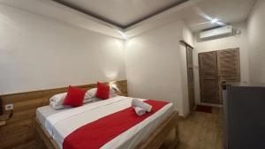 Postel nebo postele na pokoji v ubytování Abian Srama Hotel and Spa