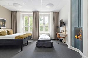 Postel nebo postele na pokoji v ubytování Best Western Hotel Svava