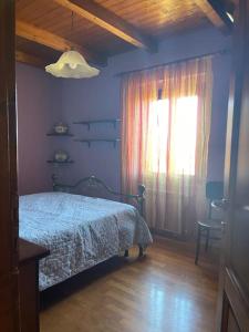 A bed or beds in a room at Agriturismo I GRANAI