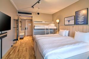 Letto o letti in una camera di Scandic Södra Kajen