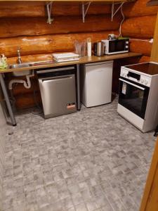 Cucina o angolo cottura di Ojaperve Peo -ja Puhkemaja