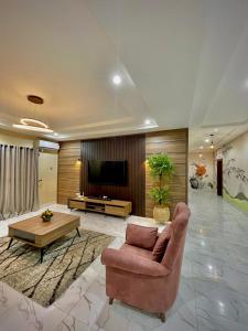 TV a/nebo společenská místnost v ubytování Integral Consults Apartment