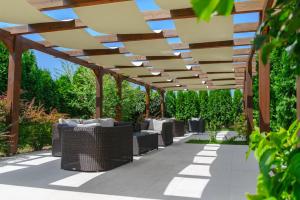 Vonkajšia záhrada v ubytovaní Emerald Hotel