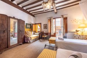 Postel nebo postele na pokoji v ubytování Peregrinando, pensión con encanto