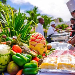 a bunch of fruits and vegetables on a table at Roma Stays - Superb 4BR at Sunset Paradise Shanzu with a Swimming Pool in Mombasa