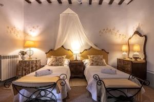 Postel nebo postele na pokoji v ubytování Peregrinando, pensión con encanto