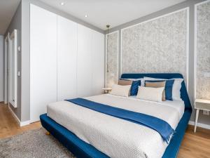 Ένα ή περισσότερα κρεβάτια σε δωμάτιο στο Luxury and Comfort Next to the Historic Center #1954