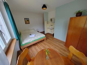 Postel nebo postele na pokoji v ubytování Hotel du Cerf