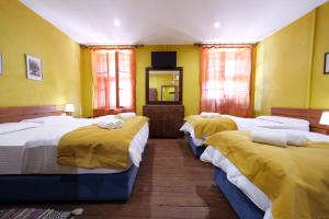 Letto o letti in una camera di Guesthouse n'Odë