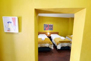 Letto o letti in una camera di Guesthouse n'Odë