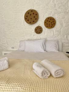 Postel nebo postele na pokoji v ubytování My Oasis Studios Mykonos