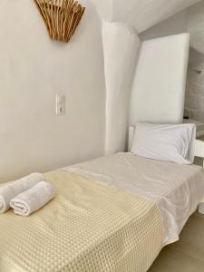 Postel nebo postele na pokoji v ubytování My Oasis Studios Mykonos