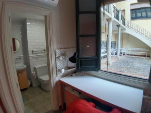 Koupelna v ubytování LoopINN Granada