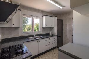 Køkken eller tekøkken på Club Villamar - Juliana